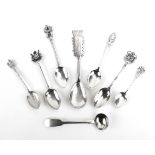 Five silver spoons including two enamelled souvenir spoons and others, various dates and makers,