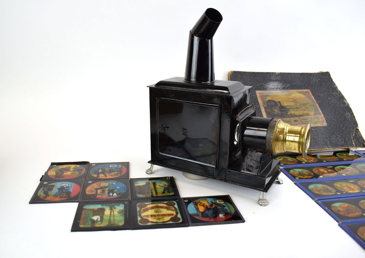A Bing black tole magic lantern and thirty-nine slides including children's stories and personal - Image 2 of 6