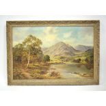 Late 19th/early 20th Century School, A man punting across a Loch, mountains in the background,