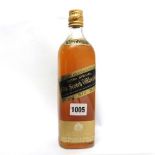 A bottle of Johnnie Walker Black Label Extra Special Old Scotch Whisky circa mid 1970s,