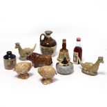 A small collection of miniatures including Beneagles Beswick figures of Nessie and Haggis