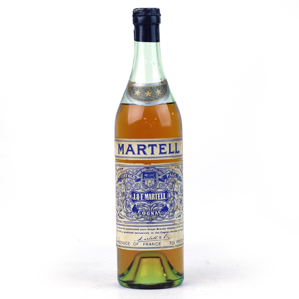 An old bottle of Martell 3 star Very Old Pale Cognac with Spring Cap circa 1950s 70 proof