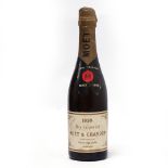 A half bottle of Moet & Chandon 1928 Dry Imperial Champagne