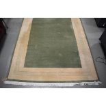 (1) Carpet with green ground, cream border with Grecian key design, approx. 200cmx250cm