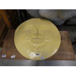 Smiling sun plaster wall plaque in yellow