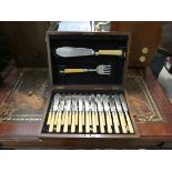 A cased set of fish knives & forks, plus servers