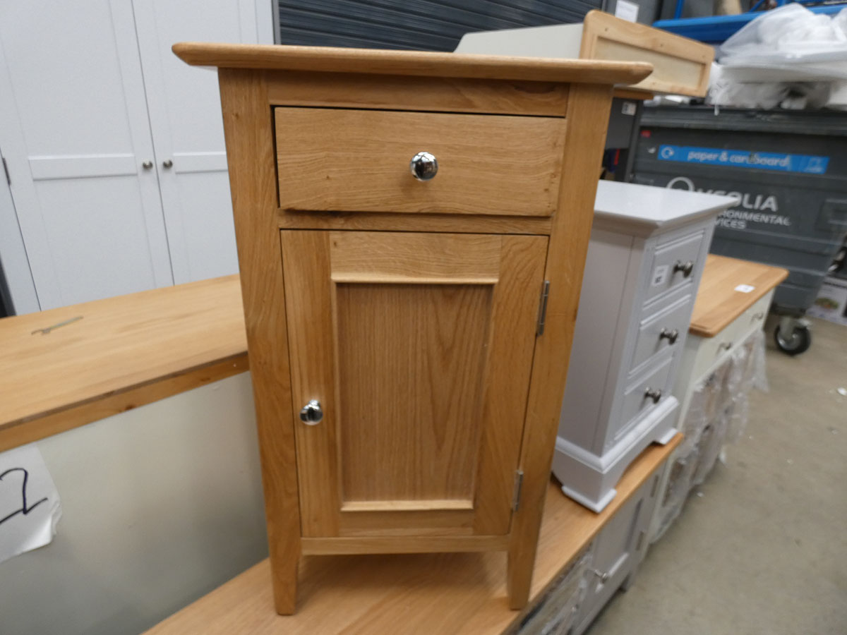 Oak single door cupboard with drawer (57)