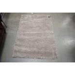 Small pale brown shag pile type carpet, approx. 120cm x 170cm