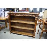 Continental oak 3 shelf bookcase with carved decoration