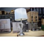 Modern chrome finish table lamp