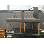 Pair of grey fabric button back dining chairs