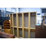 4 oak glazed narrow display cases with pair of matching CD cabinets