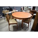 1970s G Plan extending teak dining table and 4 partial ladder back chairs
