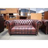 2 seater full button Chesterfield in oxblood leather