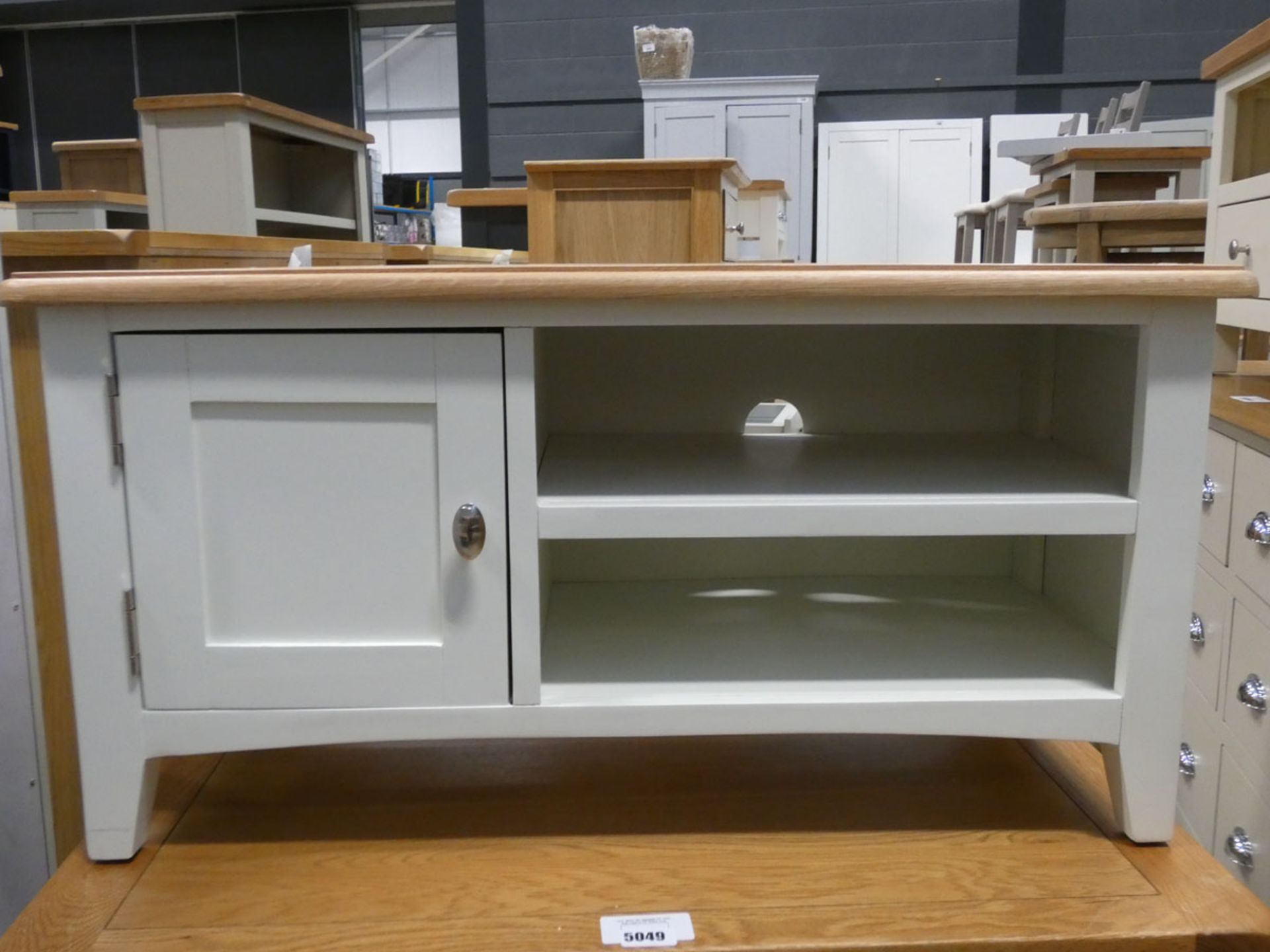 Small white painted oak TV audio unit with single cupboard and 2 shelves under (56)