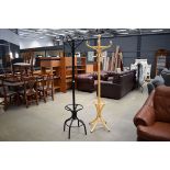 Black metal hat and coat stand with similar wooden stand