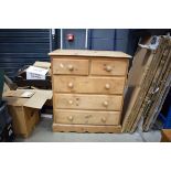 Stripped pine chest of 2 short and 3 long drawers