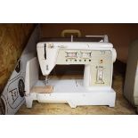 Singer sewing machine and 1 other