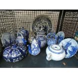 A cage containing: blue & white Delftware, plus a quantity of modern blue & white Chinese teapots