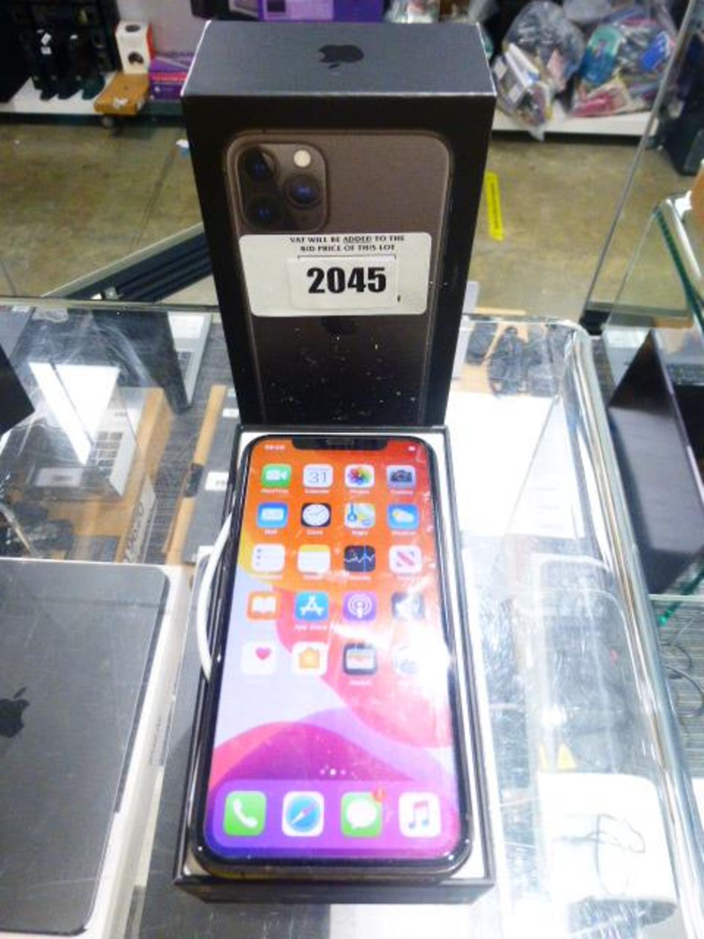 Apple iPhone 11 Pro in space grey, 54GB mobile phone. Complete with earphones, charger and box