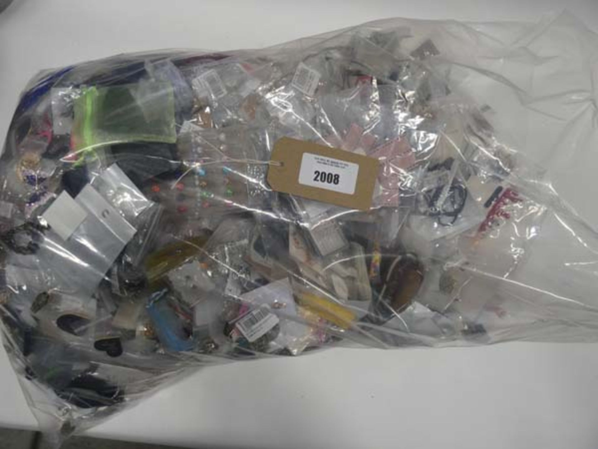 Bag containing large quantity of costume and dress jewellery