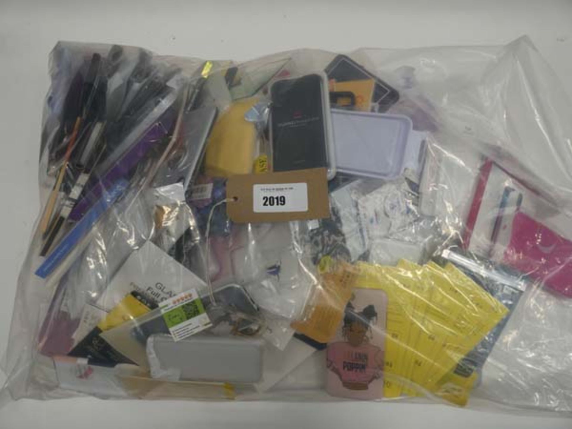 Bag containing quantity of mobile phone cases and covers