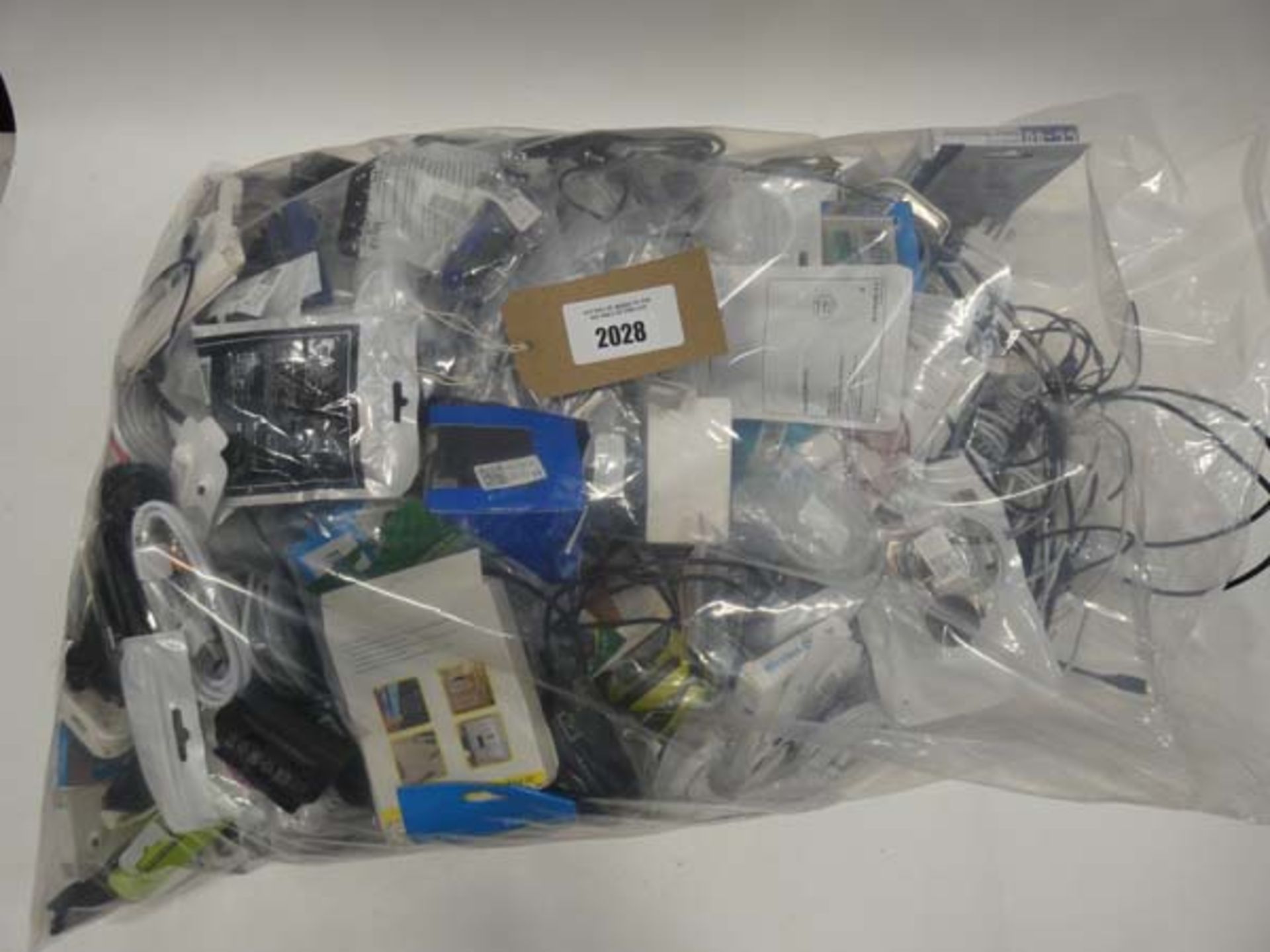 Bag containing quantity of mobile phone accessories; cables, leads, adapters, earphones, power bank,