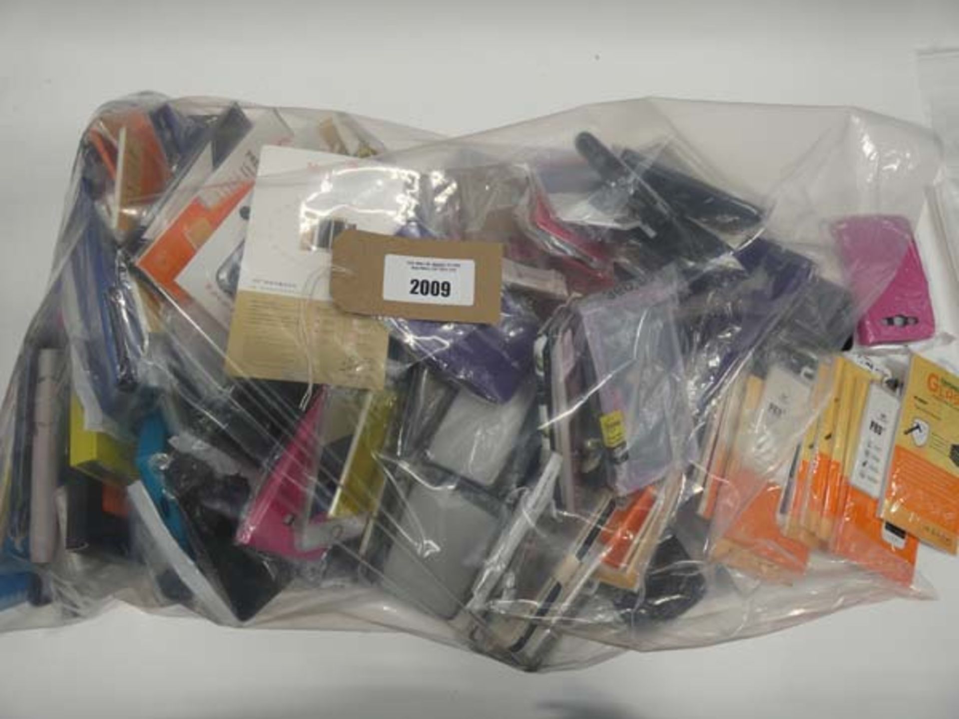 Bag containing large quantity of mobile phone cases and covers