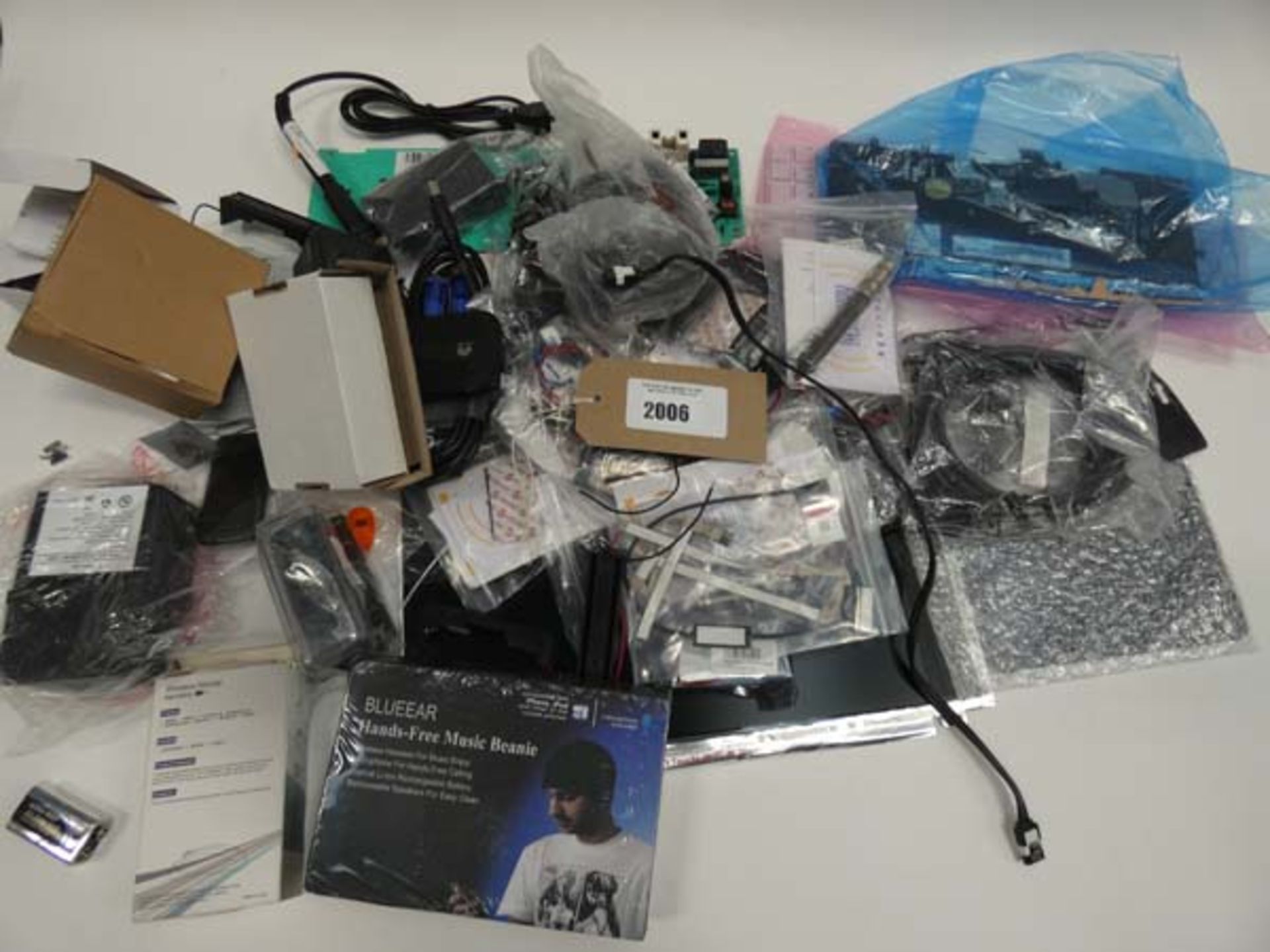 Bag containing spares/boards for PC & laptop, hands free music beanie, adapters, cables etc