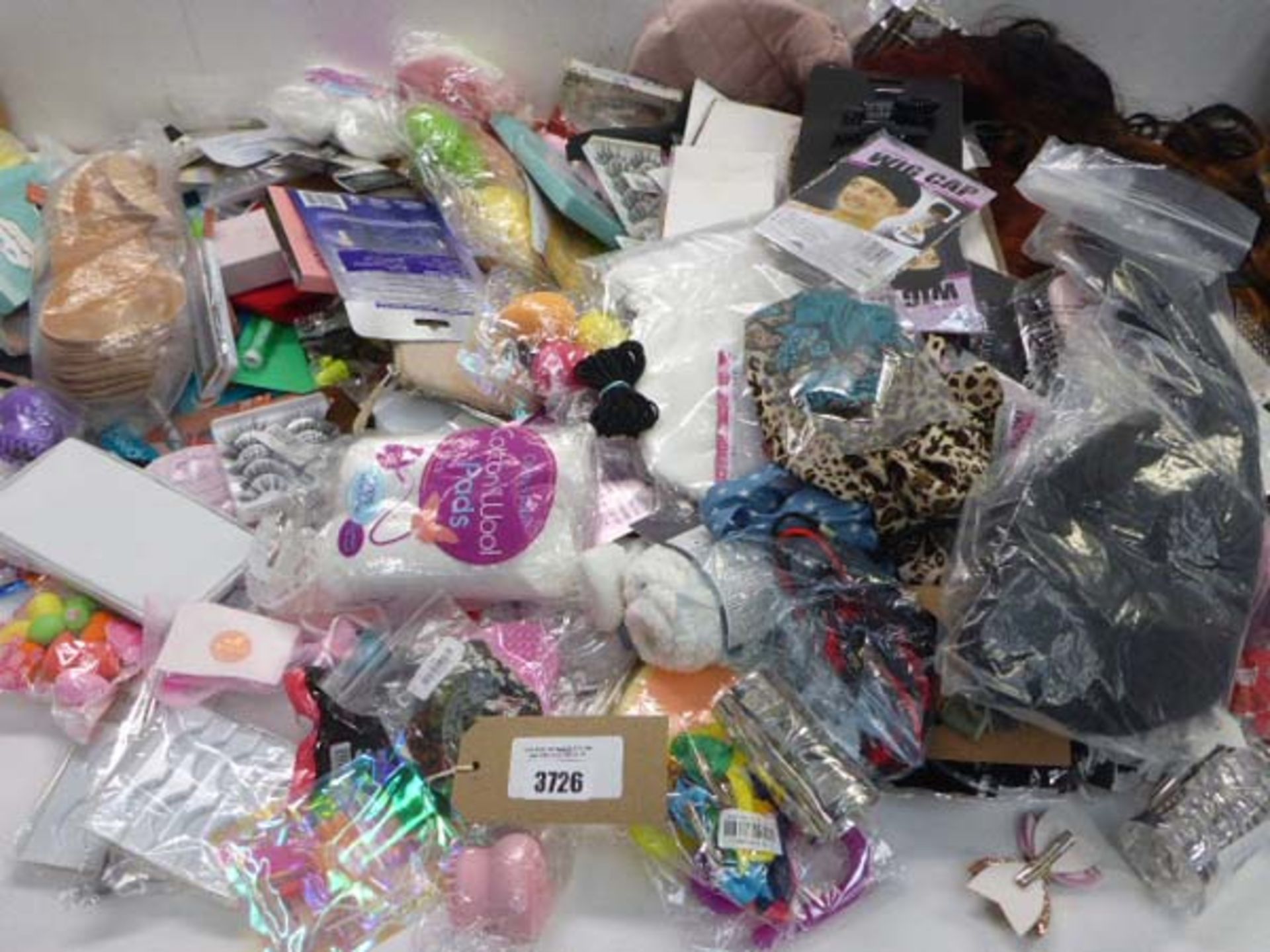 Large bag of beauty products including wigs, hair accessories, false nails & accessories, false