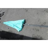 (1017) Metal pole wind up garden parasol in turquoise