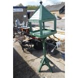 Wooden green painted bird table