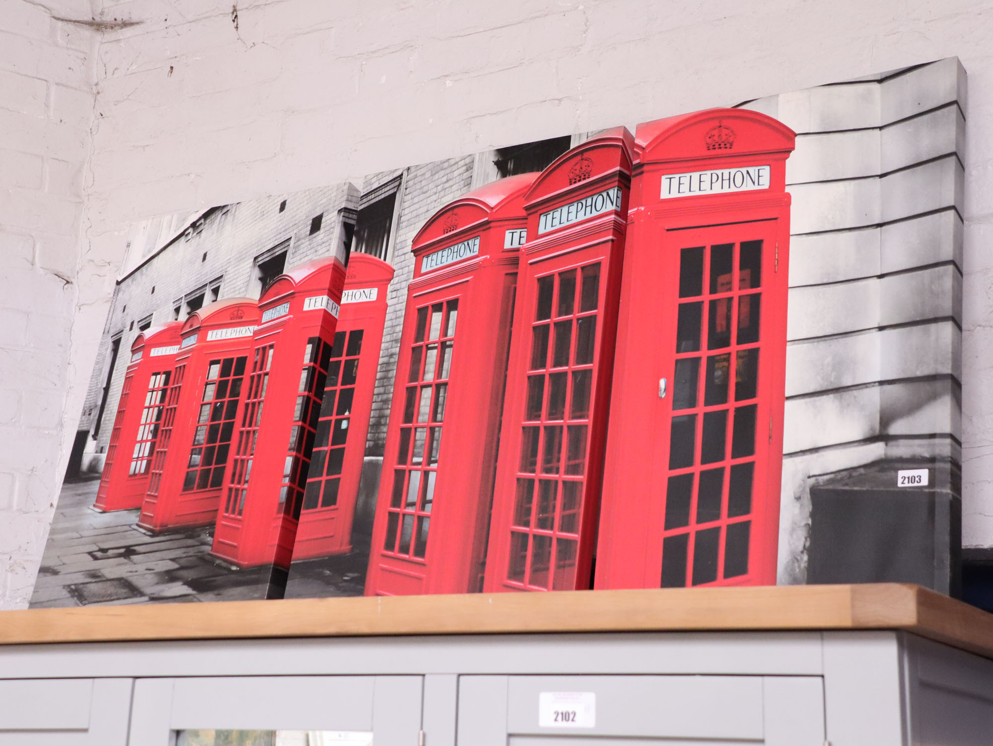 Canvas art triptych of telephone boxes