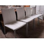 Set of 4 Italian dining chairs by Zanotta with white leatherette seats and slender metal frames