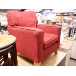 Red upholstered armchair