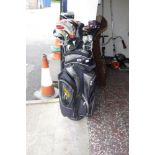 Power Caddy golf bag containing King branded golf clubs