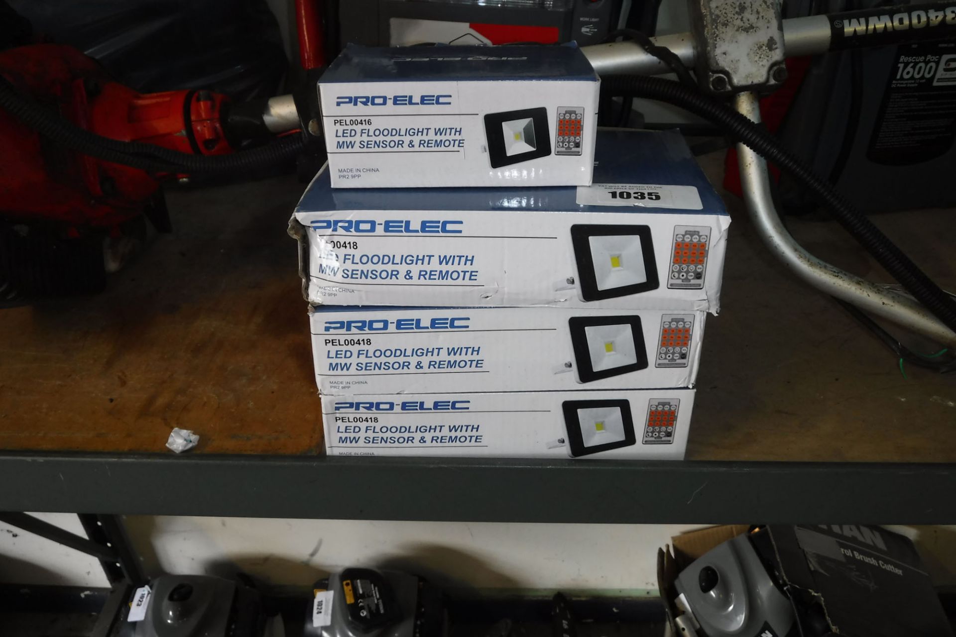 4 boxed Pro Elec LED flood lights