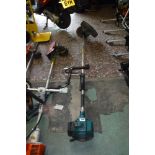 Makita petrol long arm strimmer