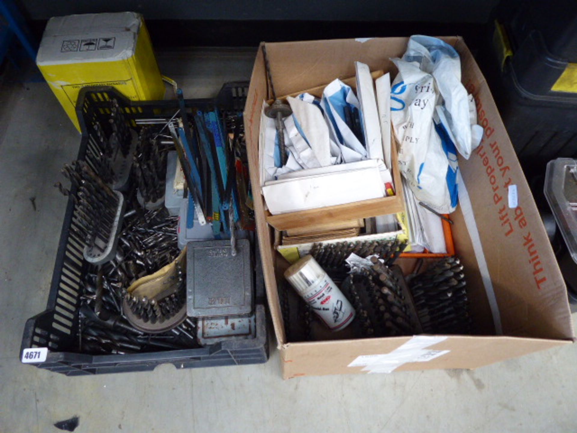 Tray and a box of various drill bits, hacksaw blades, etc