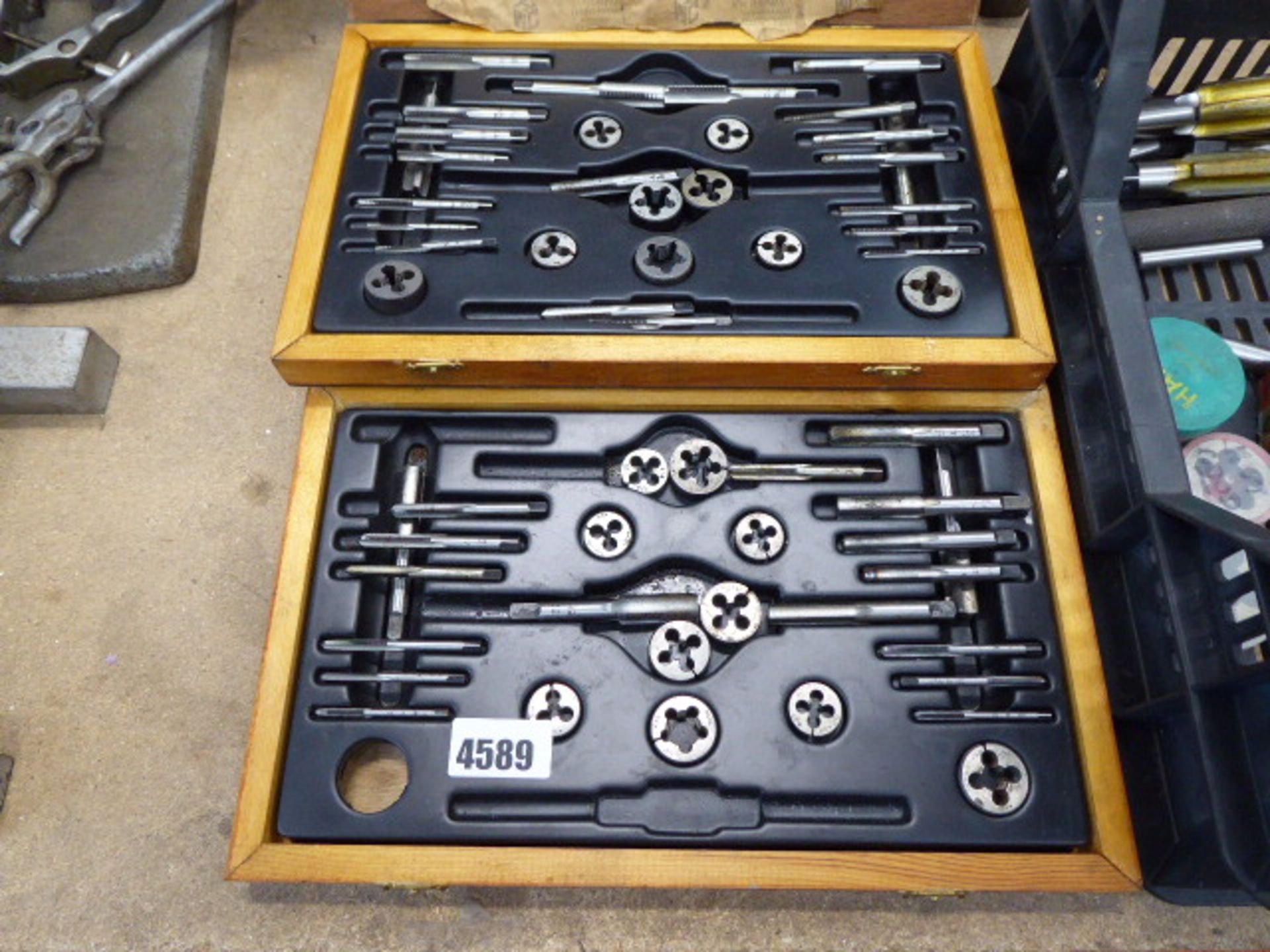 2 cased sets of taps and dies, with tray of misc. taps and dies