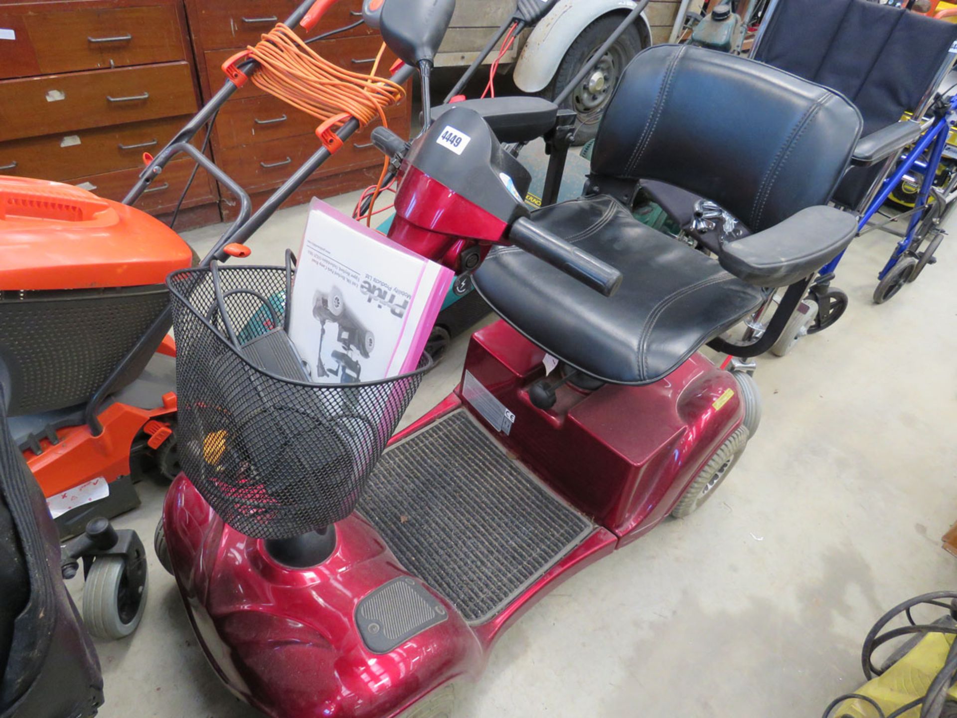 Pride red 4 wheel mobility scooter with key and charger