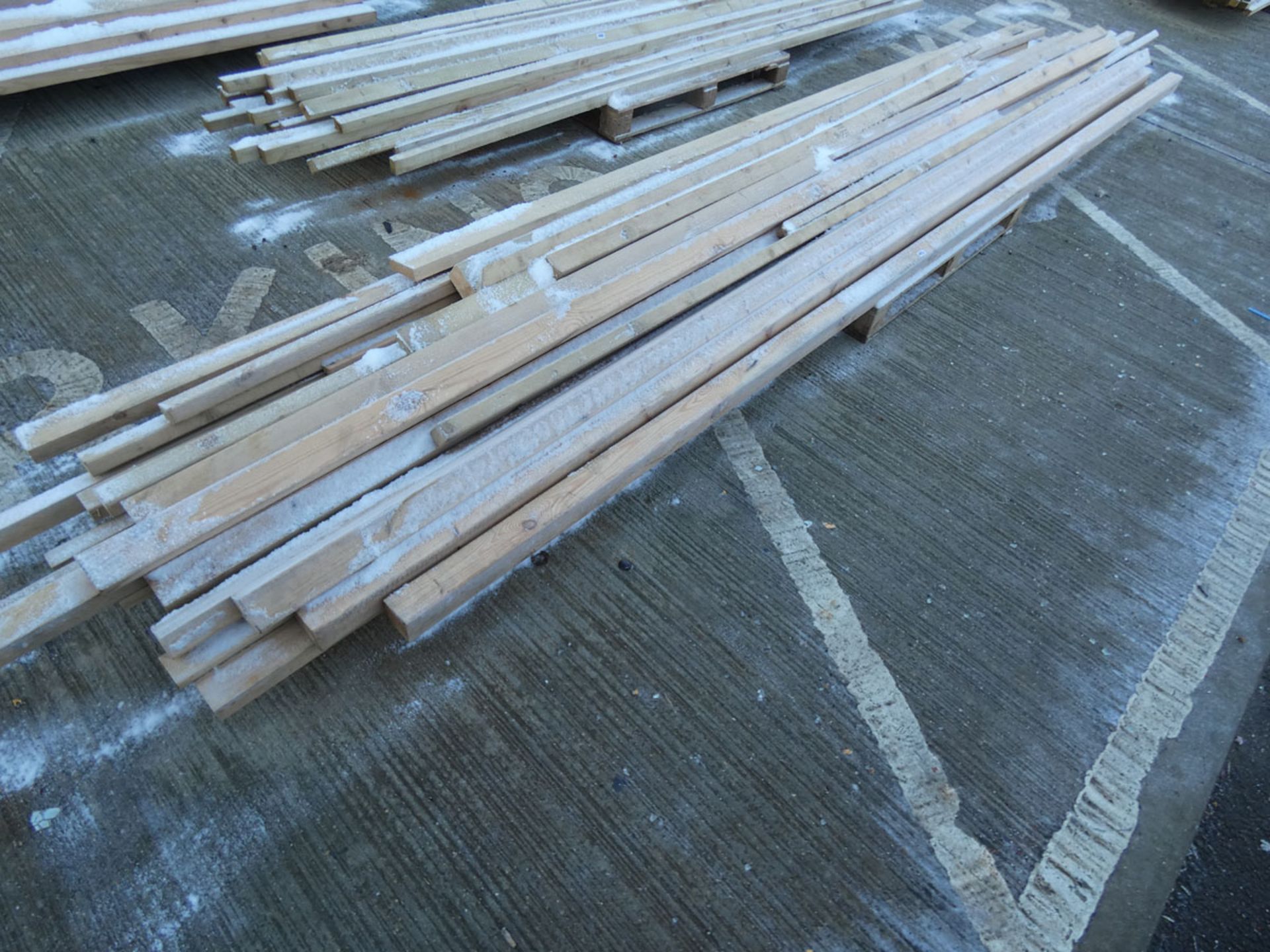 Large pallet of long length of assorted timber