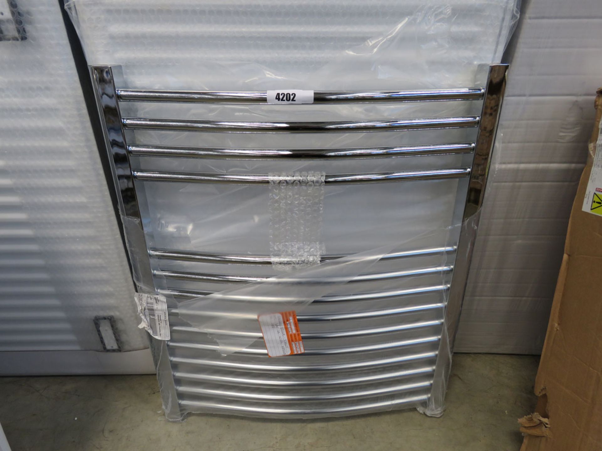 Curved chrome towel radiator