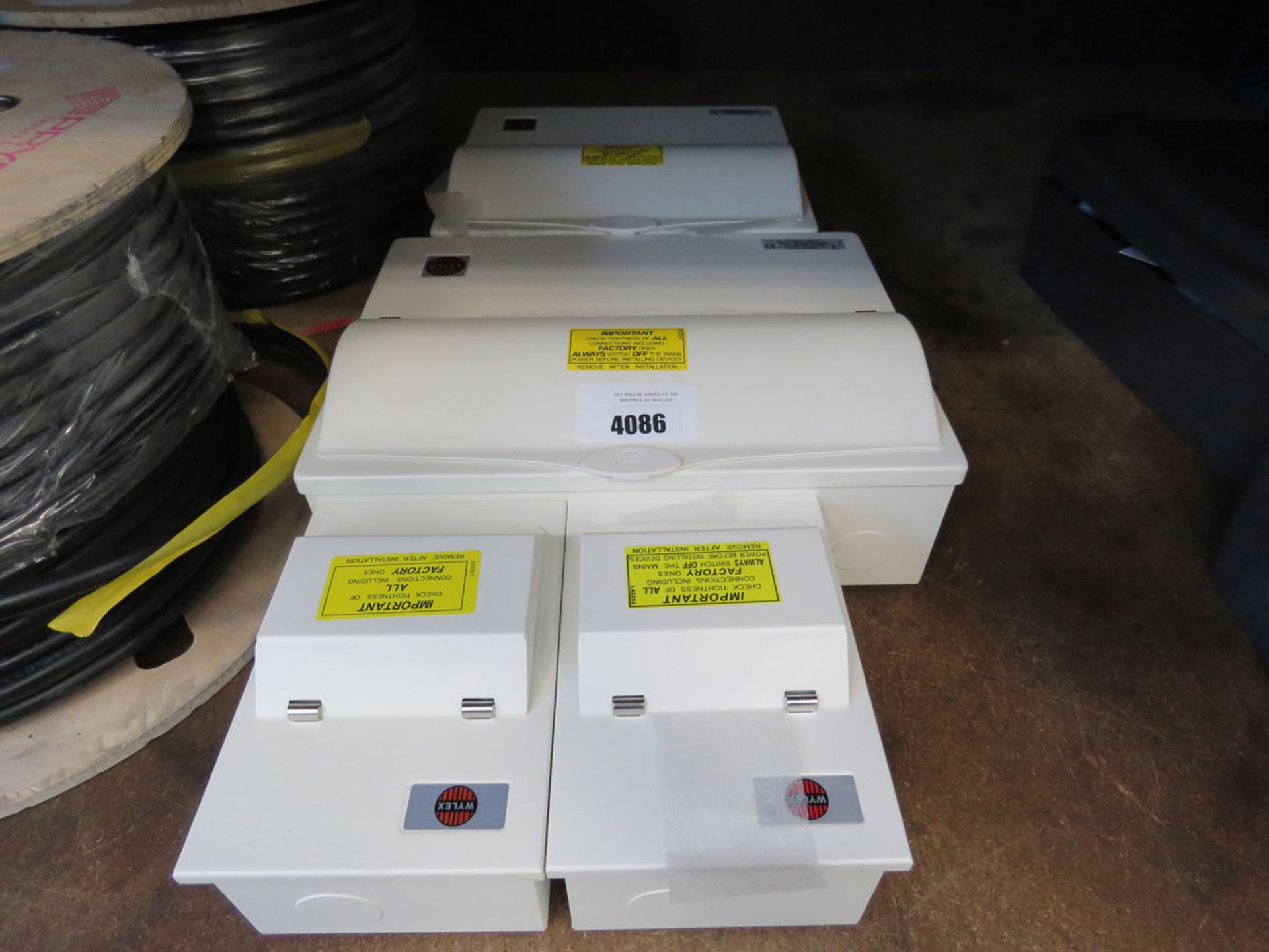 2 large and 2 small Wylex switch boxes