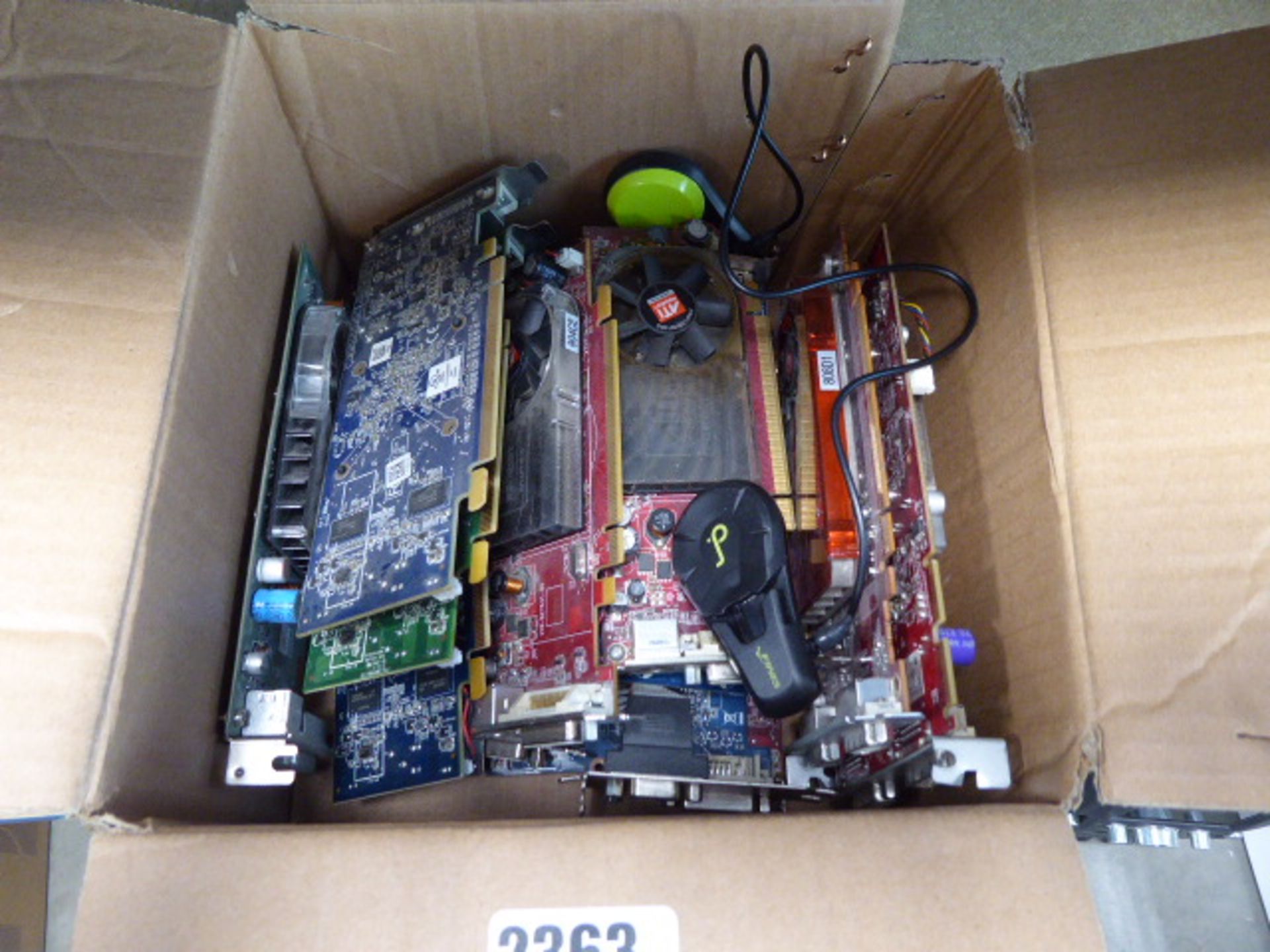 Box containing a variety of PC IE cards