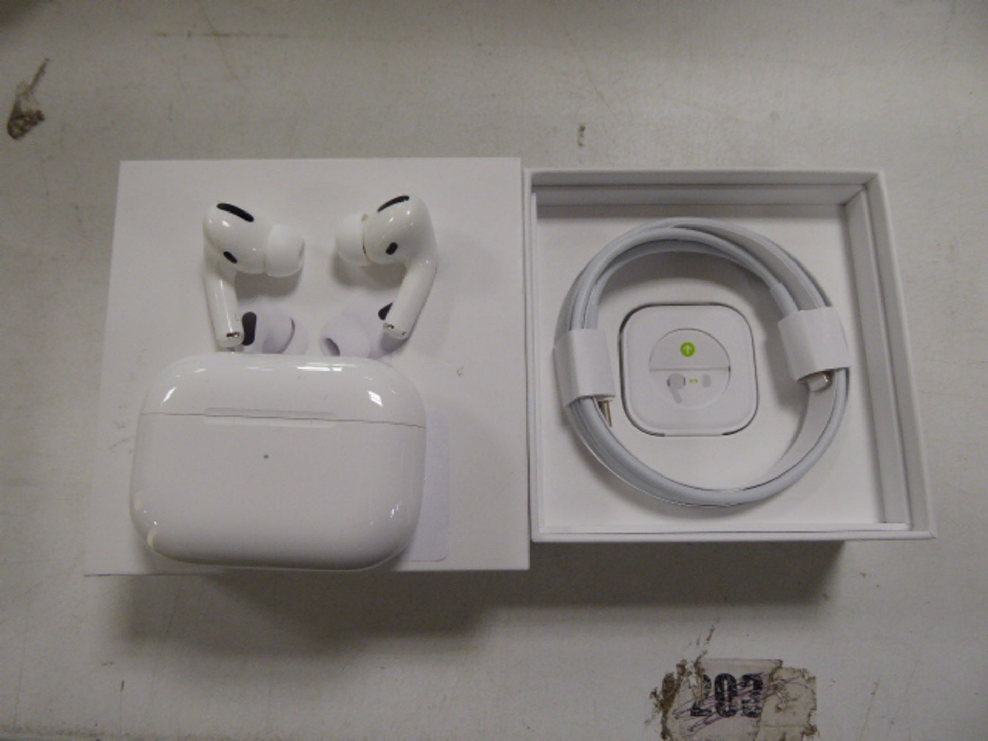 Pair of Apple Airpods Pro with wireless charging case and box