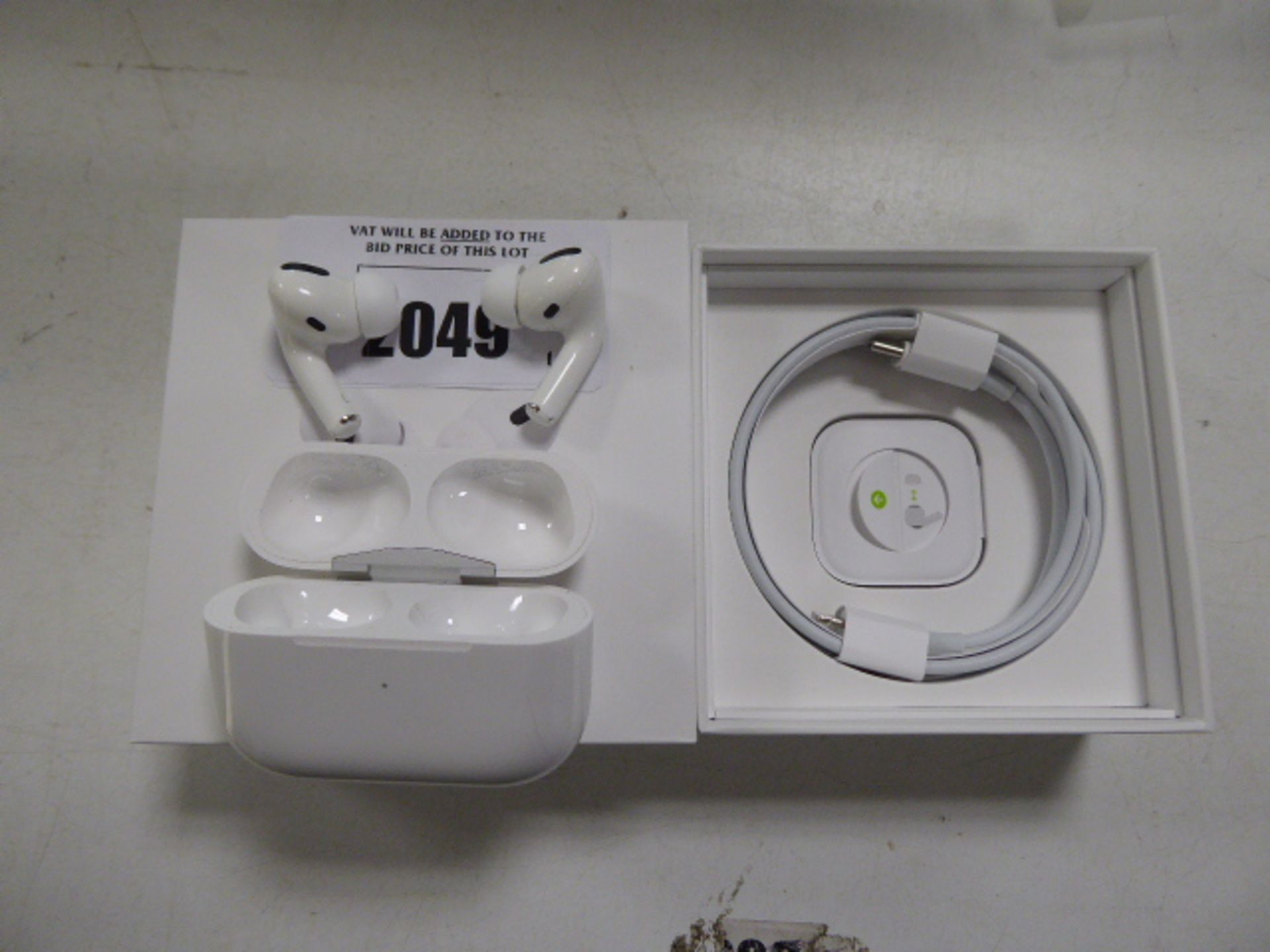 Pair of Apple Airpods Pro with wireless charging case and box