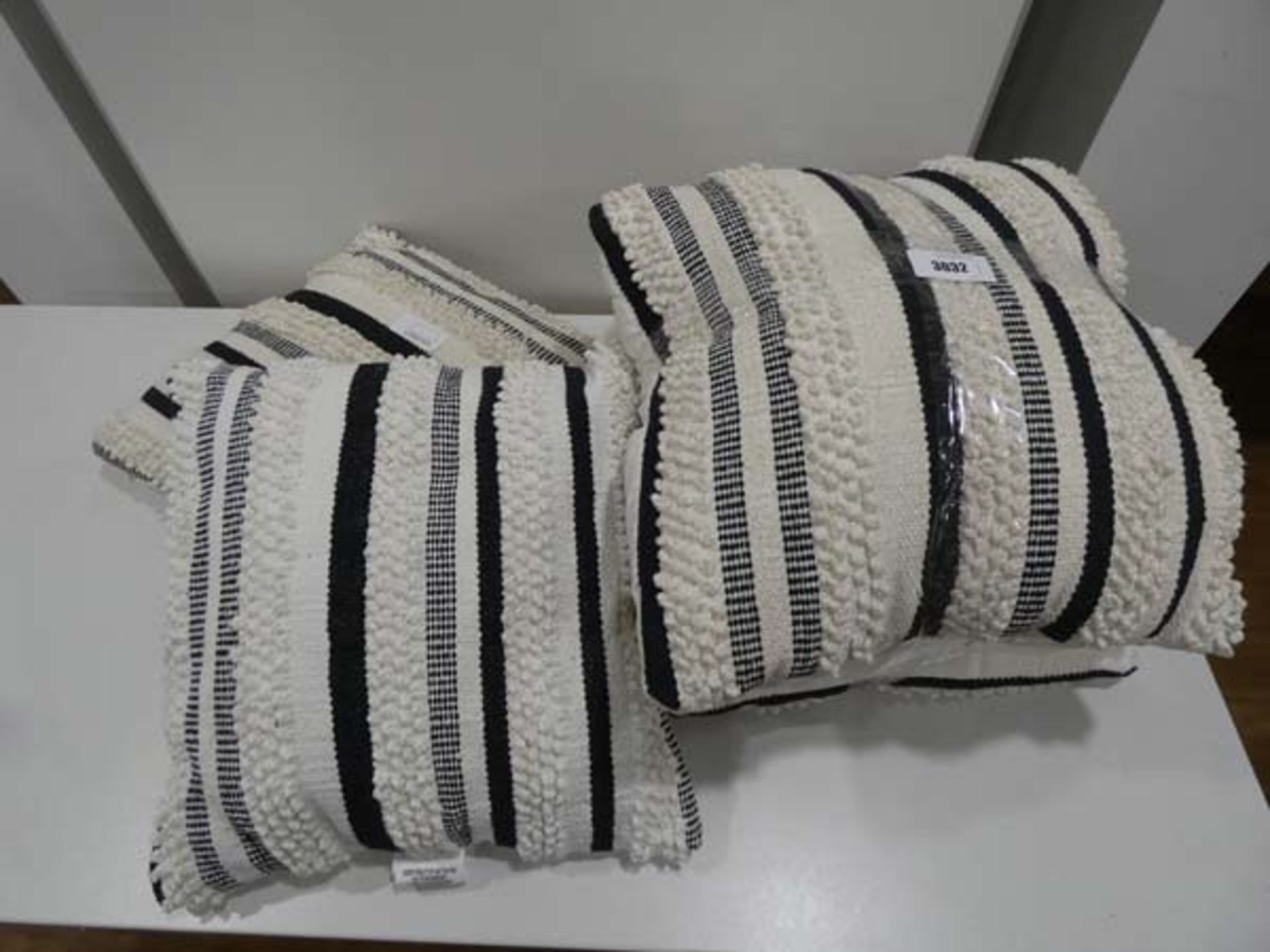 6 white and black cushions