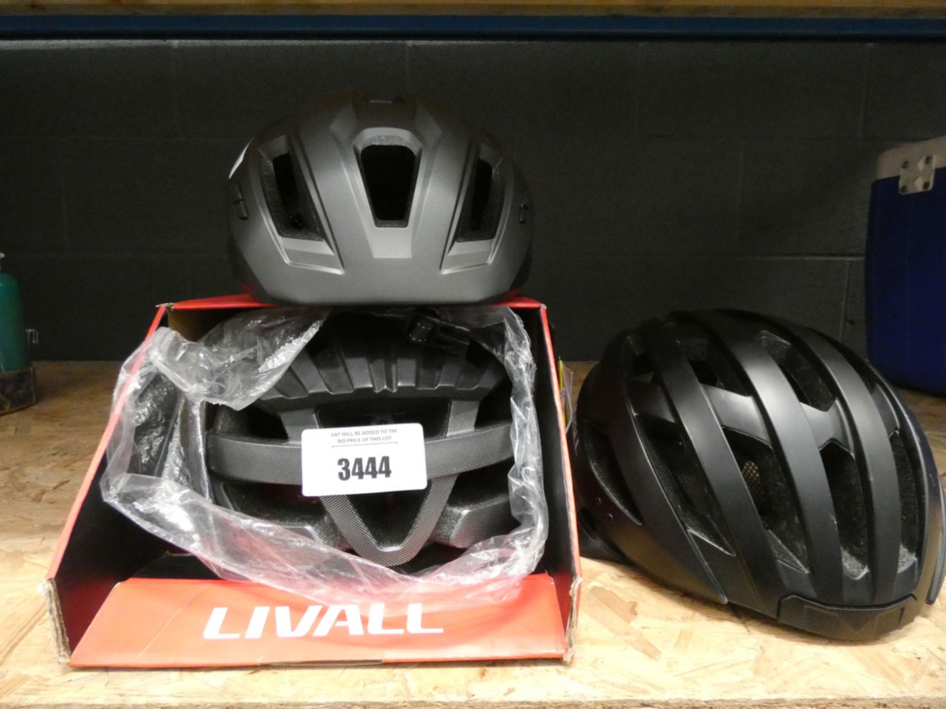 Three Livall cycle helmets