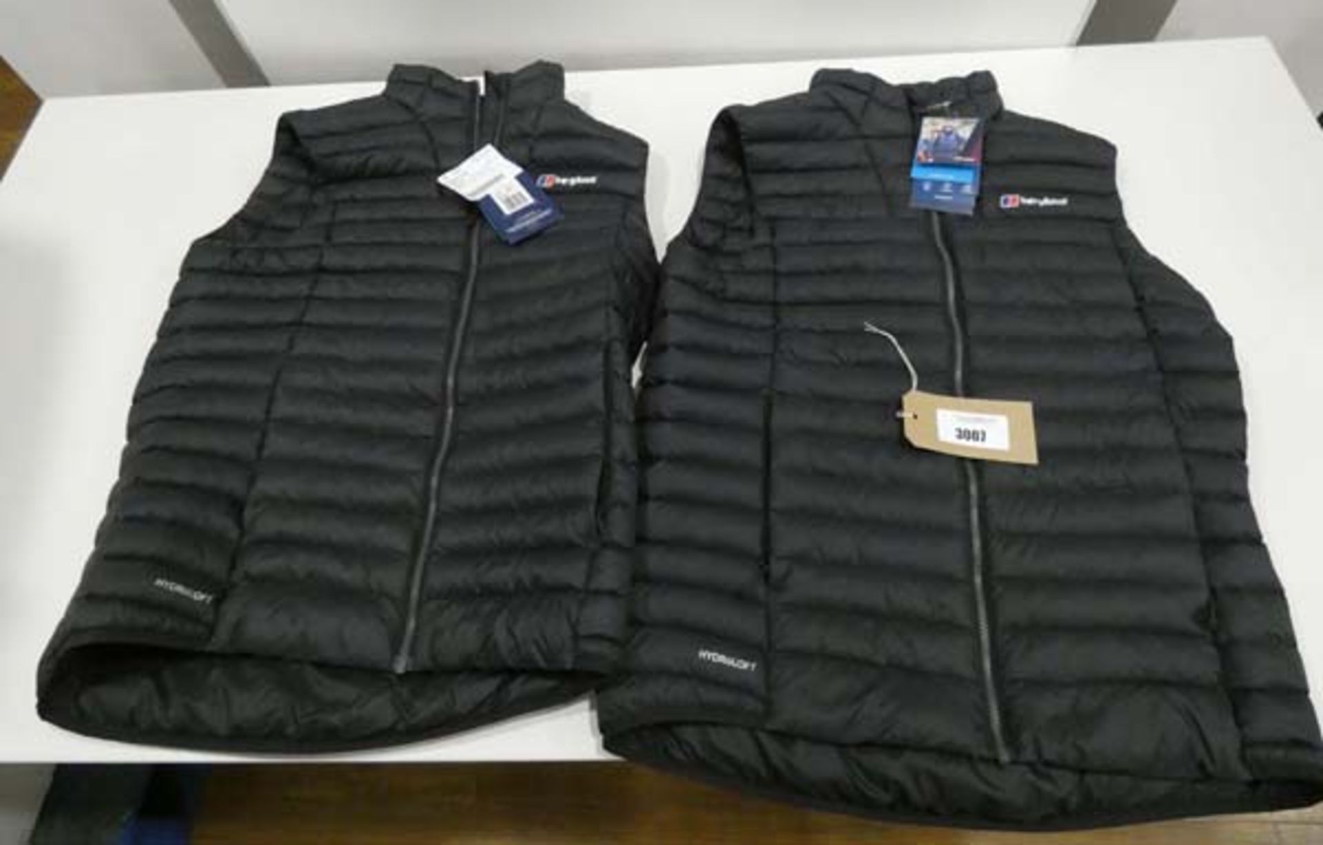 2 Berghaus gilets in dark blue size M and L